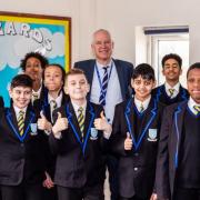 Kingsbury High School headteacher Alex Thomas with pupils after a 'good' Ofsted report