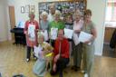 Volunteers at the Watford Blind Centre have received awards from a blindness charity.