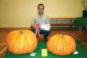 Tom Wood and his prize-winning pumpkin