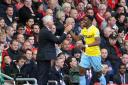 The boss congratulates Wilfried Zaha after he came off the bench to almost instantly fire the Eagles in front