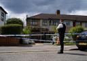 A police officer in Hainault after a 14-year-old was stabbed