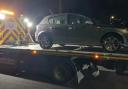 Seized - A vehicle being taken away by Essex Police