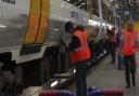 Southeastern employees put one of the company’s 339 trains through its spring deep-clean