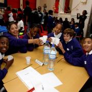 Pupils at Buxton Primary School celebrate a quiz day this year