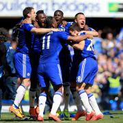 Chelsea players celebrate a first Premier League title since 2010
