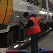 Southeastern employees put one of the company’s 339 trains through its spring deep-clean