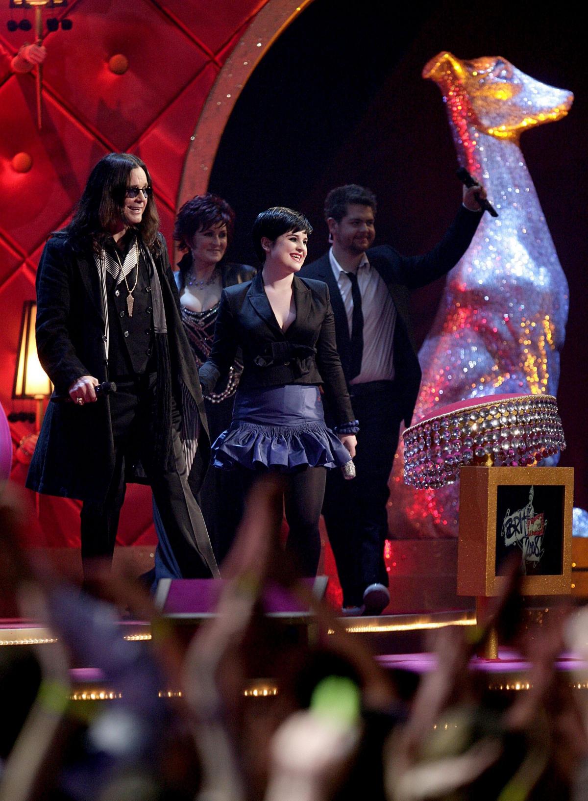 xxx-factor: Ozzy, Sharon, Kelly and Jack Osbourne on stage during the Brit Awards 2008 at which Sharon Osbourne shouted at Vic Reeves ''Shut up, you're pissed, piss off, you bastard''...