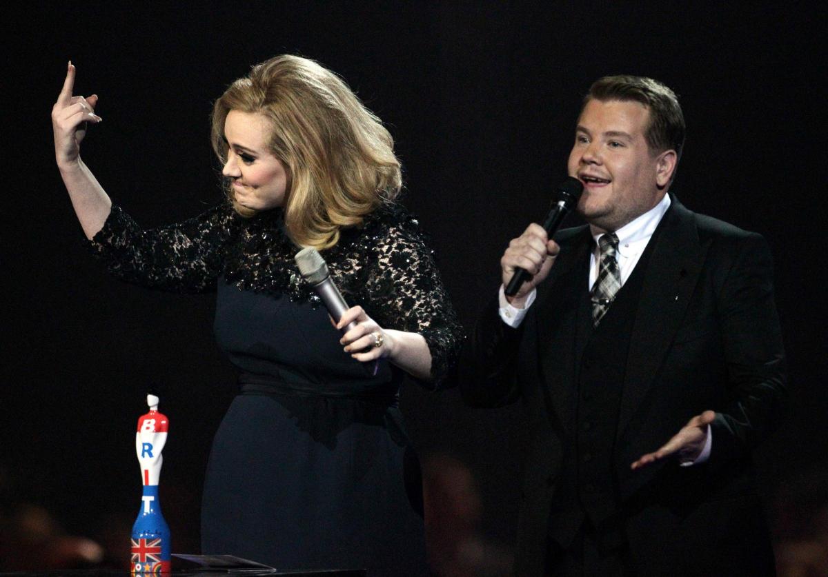Someone like you: singer Adele gives the middle finger to presenter James Corden after her acceptance speech for Album of the Year was cut short during the 2012 Brit Awards ...