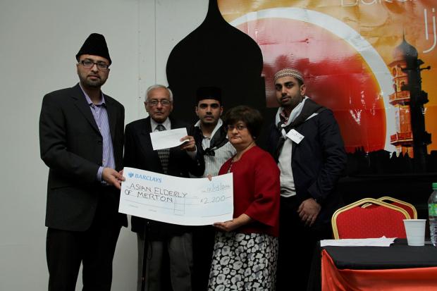 This Is Local London: AMYA UK present a cheque to Asian Elderly
