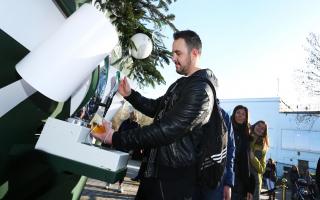 Carlsberg's Christmas tree on London's Southbank was dispensing free beer to passers-by