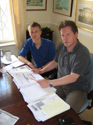 Gravesham MP Adam Holloway shows reporter Michael Purton his receipts for expenses claimed on his second home.