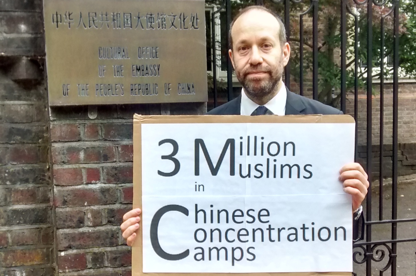 Here's why people are protesting outside the Chinese Embassy