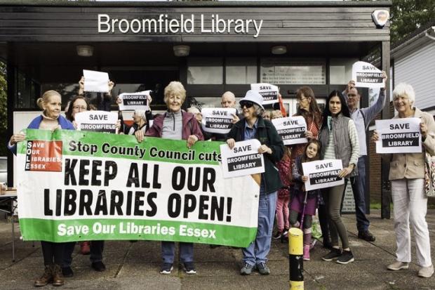 Protesters stood outside Broomfield Library on Saturday, September 28