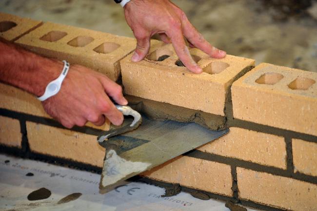 A trainee bricklayer (Ian Nicholson/PA)