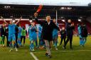 Darren Currie leading Barnet's celebrations at Sheffield United last season. Picture: Action Images