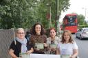 Theresa Villiers MP (second from left) with campaigners against building on High Barnet Tube station car park