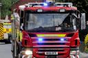 25 firefighters rush to deal with blaze at home after whole roof catches alight