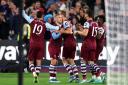 West Ham United players celebrate their first goal against Arsenal
