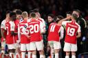 Mikel Arteta talks to his Arsenal players during their game with Sevilla
