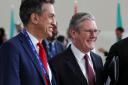 Labour Party leader Sir Keir Starmer walks with shadow secretary of state for energy security and net zero Ed Miliband at Cop28 (Chris Jackson/PA)