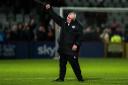Steve Evans punches the air in delight. Picture: RHIANNA CHADWICK/PA