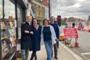 Volunteers at Amnesty Bookshop l-r Lamorna Ash, Rita Monjardino, Rachel Schwartz and Nick Alexander await the reopening of Kentish Town Tube station and end to bridge repairs