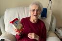 A delighted resident gets an Easter egg gift from Romford shoppers