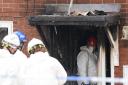 Forensic officers at the scene in the Dunstall Hill area of Wolverhampton (PA)