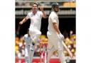 England's James Anderson celebrates dismissing Australia's Shane Watson during the first Ashes Test at the Gabba