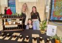 Katie and her daughters at their family stall at the Craft and Flea market in Guilford Cathedral.