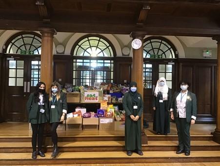 Pupils from Walthamstow School for Girls with items donated to Eat or Heat