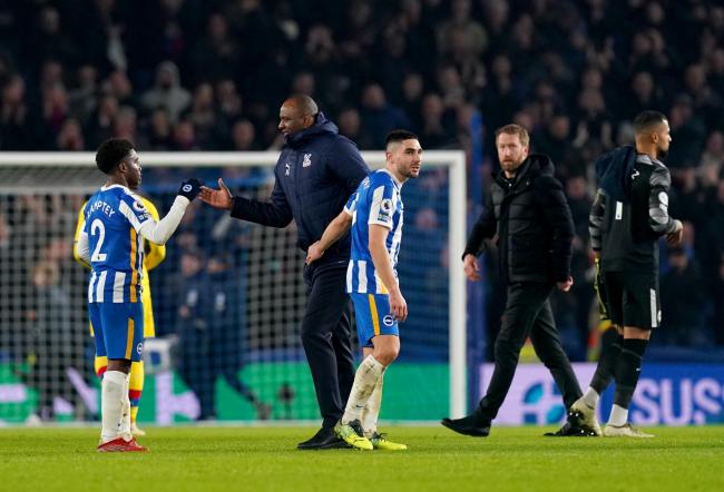Brighton and Hove Albion's Tariq Lamptey (left) shakes hands with Crystal Palace manager Patrick Vieira at the end of the Premier League match at the AMEX Stadium, Brighton.