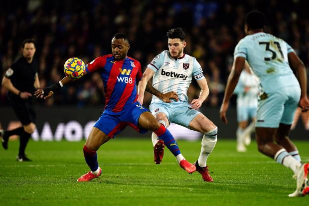 This Is Local London: Crystal Palace's Jordan Ayew (left) and West Ham United's Declan Rice battle for the ball during the Premier League match at Selhurst Park, London.