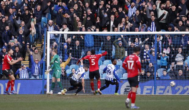 This Is Local London: Sheffield Wednesday's Callum Paterson (third left) scores his sides second goal of the game during the Sky Bet League One match at Hillsborough Stadium, Sheffield