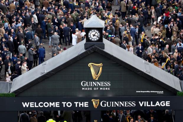 This Is Local London: The Guinness Village is always a popular hang-out at the Cheltenham Festival.(Tim Goode/PA)