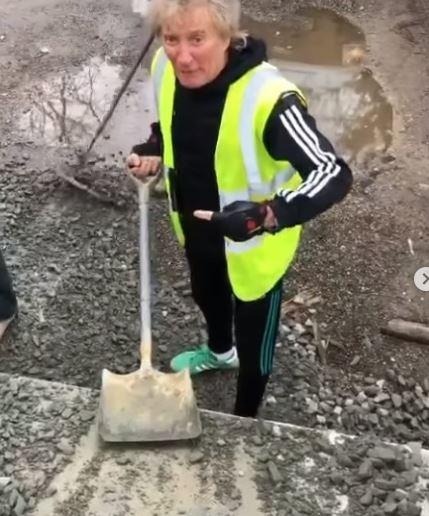 Sir Rod Stewart took action into his own hands after he was joined by friends filling in potholes in a road near his home. Credit: Instagram