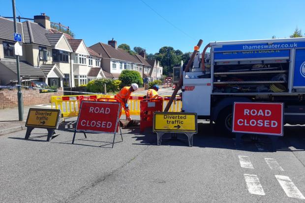 Thames Water staff showed up this afternoon to ensure the structural integrity of the water pipes on the street where the sinkhole appeared. CREDIT: Kiro Evans - free to use