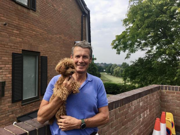 This Is Local London: Richard Higgs with his dog spark said there was a buzz at Wimbledon when the tournament was taking place (Picture: Tara O'Connor)