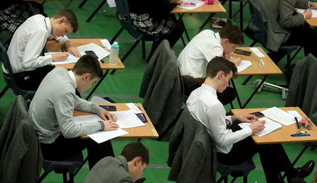 This Is Local London: An AQA walkout could delay GCSE and A Level results. Picture: PA
