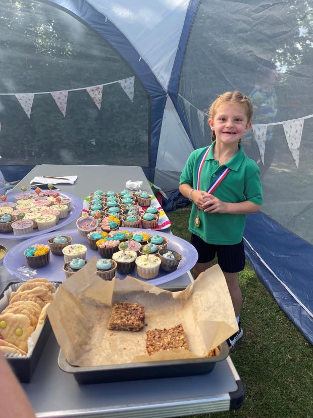 This Is Local London: Seven-year-old Sienna Smith enjoying the St John's Summer Fayre