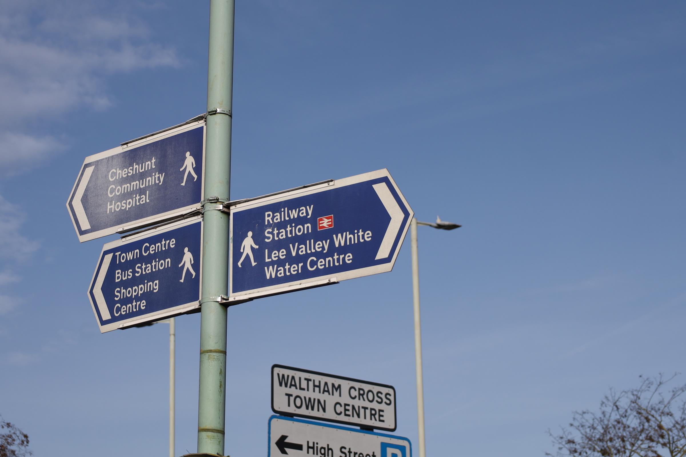 Signs for the Lee Valley White Water Centre and Cheshunt Community Hospital in Waltham Cross, Hertfordshire.