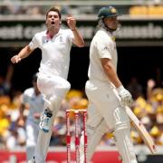 England's James Anderson celebrates dismissing Australia's Shane Watson during the first Ashes Test at the Gabba