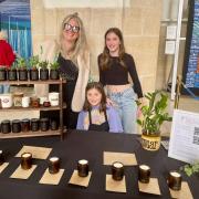 Katie and her daughters at their family stall at the Craft and Flea market in Guilford Cathedral.