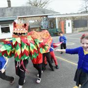 Ennerdale School pupils learn about Chinese culture during their topic on the Chinese New Year.  pic MIKE McKENZIE 27th Feb 2015

DRAGON DANCE:  Ennerdale School pupils have a ball as they dance around with the Cheinese Dragon they made during the