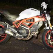 Ducati Monster, with a white body, red chassis and red wheels used in Dalston drive-by shooting