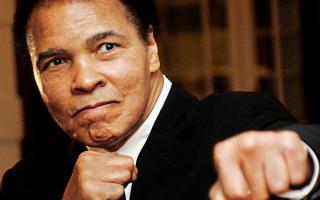 Muhammad Ali poses during the Crystal Award ceremony at the World Economic Forum (WEF) in Davos, Switzerland, on January 28, 2006. Picture: Action Images