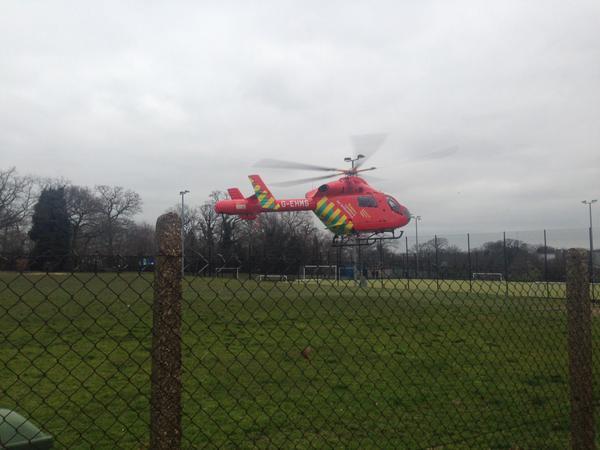 An air ambulance lands by Trinity School after a girl was reportedly hit by a bus this afternoon